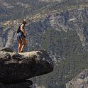 brave-person-walking-out-on-the-glacier-point-ledge